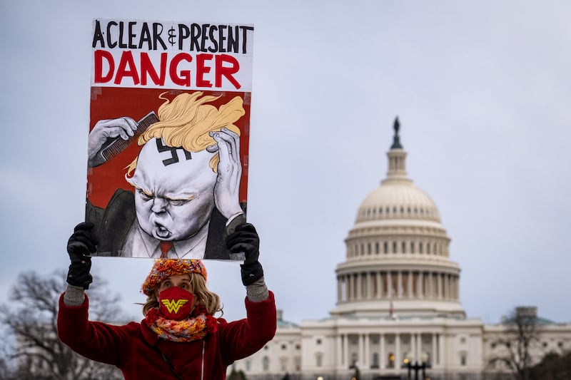 Activists participate in the January 6 Candlelight Vigil for Democracy at Union Square in front of the US Capitol in Washington, US, last week. EPA