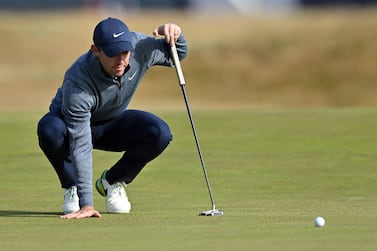 Northern Ireland's Rory McIlroy lines up a putt on the 17th green during a practice round for The 150th British Open Golf Championship on The Old Course at St Andrews in Scotland on July 13, 2022.  (Photo by Glyn KIRK  /  AFP)  /  RESTRICTED TO EDITORIAL USE