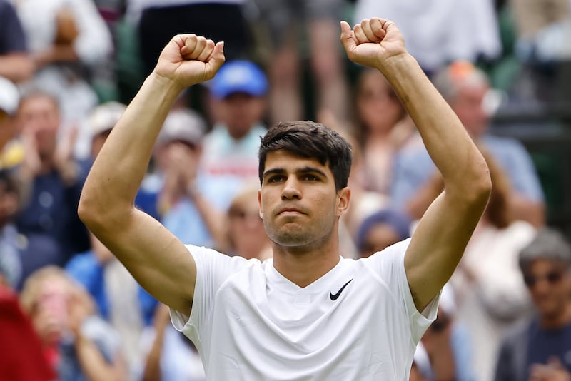Carlos Alcaraz after beating Mark Lajal 7-6, 7-5, 6-2 in the first round of Wimbledon on July 1, 2024. EPA