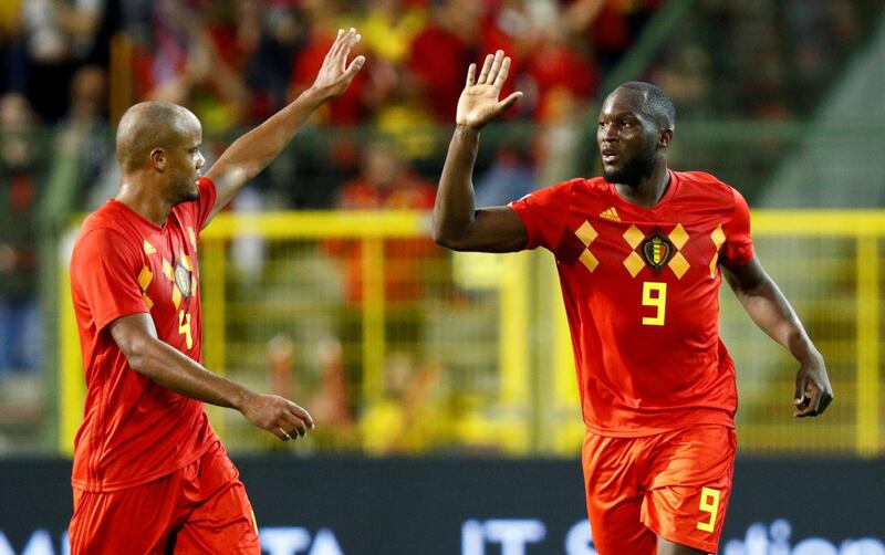 Belgium's Romelu Lukaku celebrates scoring their second goal with Vincent Kompany. Reuters