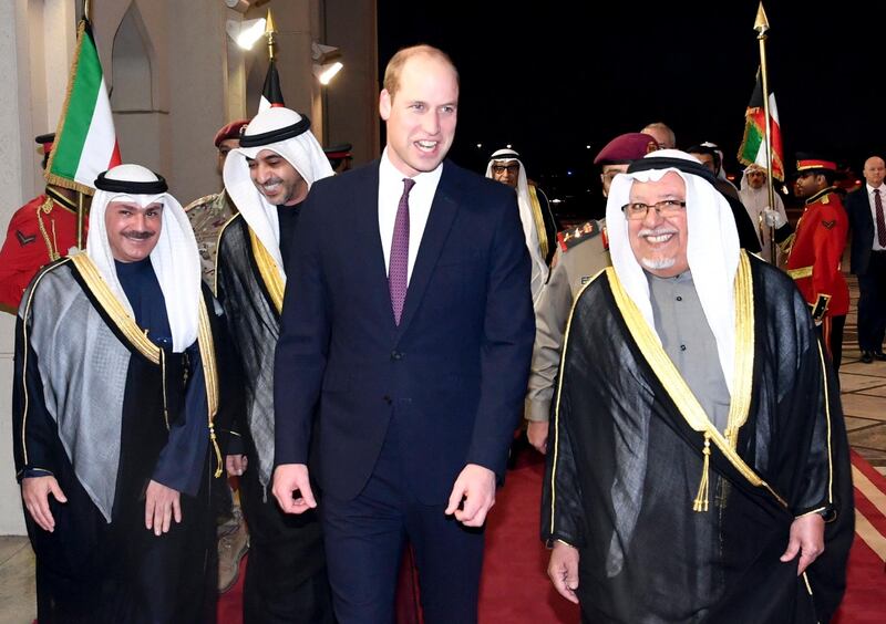 Britain's Prince William, the Duke of Cambridge, is received by Kuwait's Minister of the Amiri Diwan (Royal Palace) Affairs, Sheikh Ali al-Jarrah al-Sabah, at Kuwait International Airport.  EPA