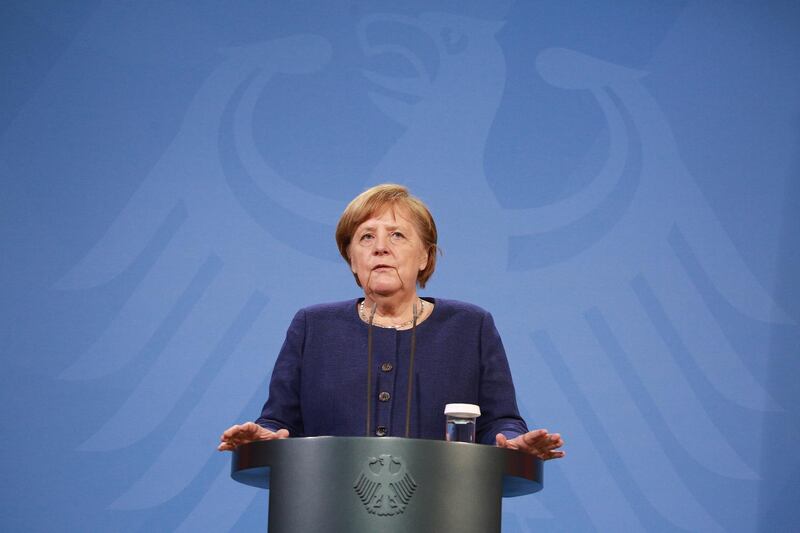 epa09036529 German Chancellor Angela Merkel holds a press conference after the European Council video conference, Berlin, Germany, 25 February 2021.  EPA/CHRISTIAN MARQUARDT / POOL