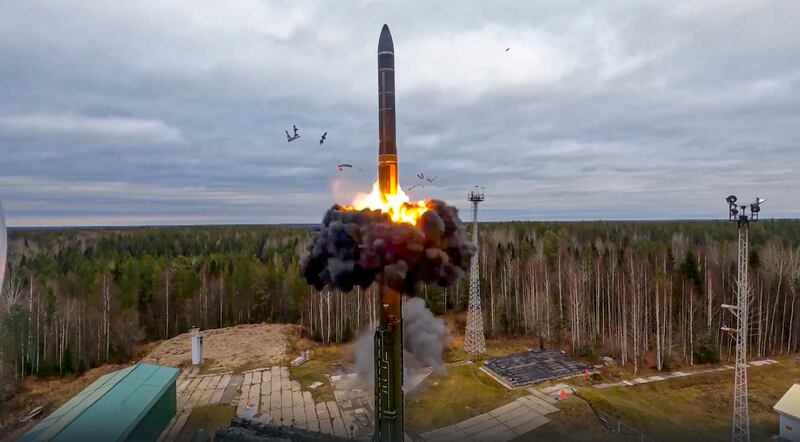 A Yars intercontinental ballistic missile is test-fired as part of a nuclear drill in Plesetsk, north-west Russia. AP