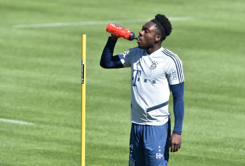 Bayern Munich's Canadian midfielder Alphonso Davies drinks during a training session. AFP