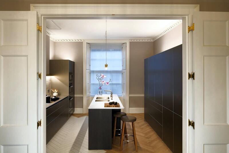 The kitchen is adjacent to an open plan dining room. Courtesy CBRE