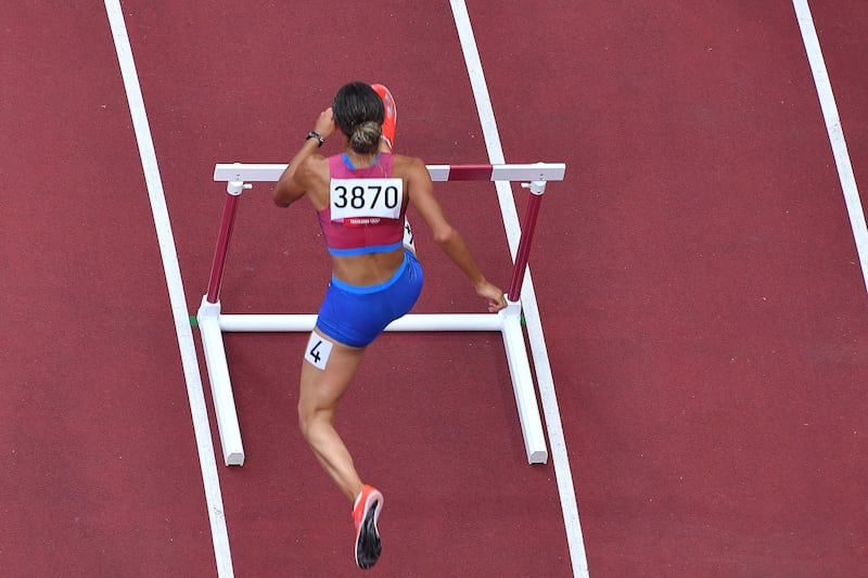 USA's Sydney Mclaughlin competes to win the women's 400m hurdles final setting a new world record.