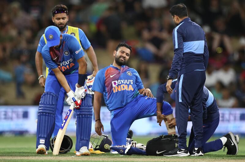 India captain Rohit Sharma had to retire hurt because of a calf injury. Getty