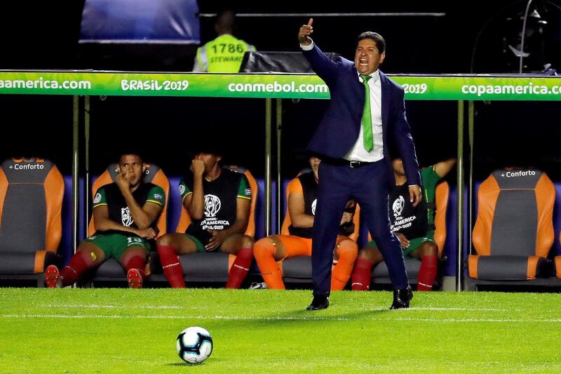 Bolivia manager Eduardo Villegas shouts instructions from the sidelines. EPA