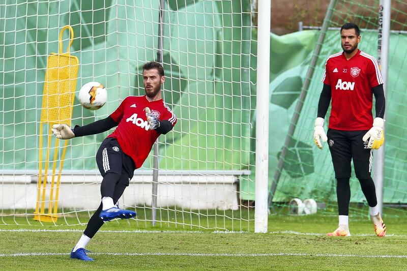 COLOGNE, GERMANY - AUGUST 15:  David de Gea and Sergio Romero of Manchester United in action during a training session at RheinEnergieStadion on August 15, 2020 in Cologne, Germany. (Photo by Matthew Peters/Manchester United via Getty Images)