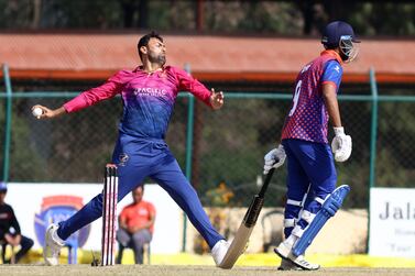 Hazrat Bilal of UAE bowls in during match between Nepal and the UAE at TU Cricket Stadium on on November 16, 2022. Photo by : Subas Humagain