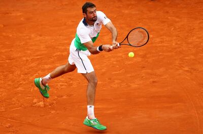 MONTE-CARLO, MONACO - APRIL 16: Marin Cilic of Croatia plays a backhand against Guido Pella of Argentina in their second round match during day 3 of the Rolex Monte-Carlo Masters at Monte-Carlo Country Club on April 16, 2019 in Monte-Carlo, Monaco. (Photo by Clive Brunskill/Getty Images)