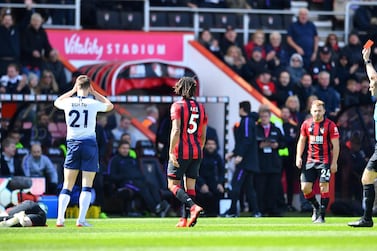 Tottenham's Juan Foyth is shown a red card by referee Craig Pawson after fouling Bournemouth's Jack Simpson. Reuters