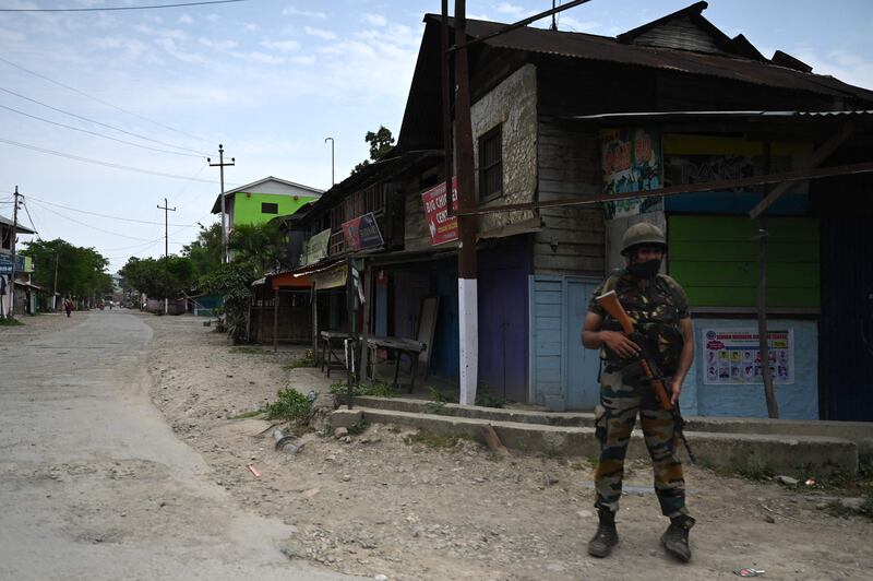 A soldier stands guard during a curfew earlier this month in Bishnupur, Manipur. AFP