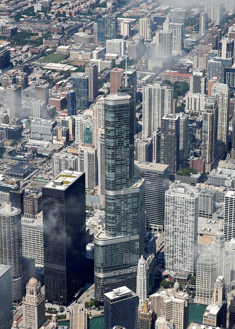 Trump International Hotel & Tower Chicago is seen during fly over before the 60th annual Chicago Air and Water Show on August 16, 2018 in Chicago, Illinois. (Photo by Kamil Krzaczynski / AFP)