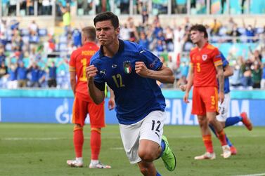 TOPSHOT - Italy's midfielder Matteo Pessina runs to celebrate the opening goal during the UEFA EURO 2020 Group A football match between Italy and Wales at the Olympic Stadium in Rome on June 20, 2021. / AFP / POOL / ALBERTO LINGRIA