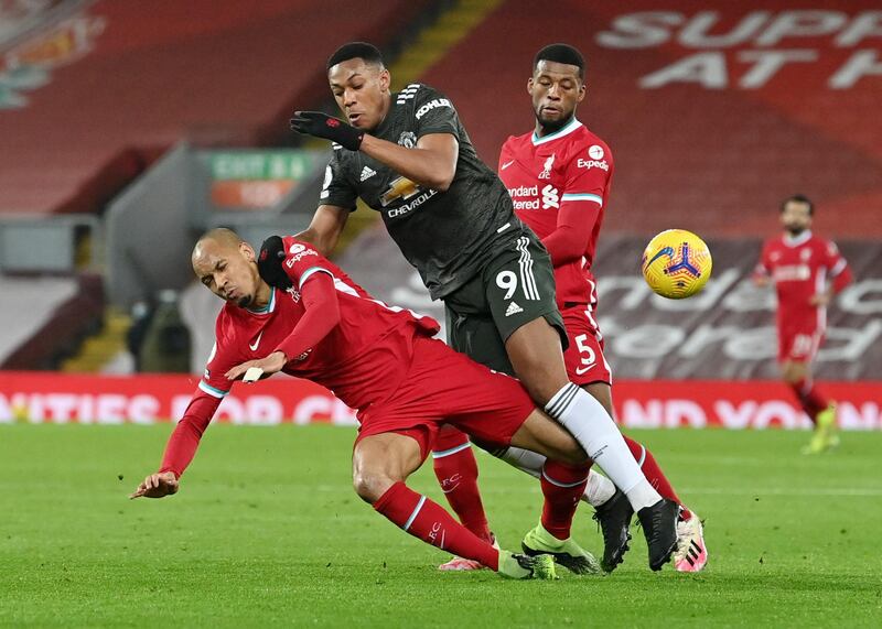 Fabinho - 8. Another composed performance by the Brazilian. He produced a brilliant sliding block to stop a Fernandes opportunity and snuffed out a Rashford counter-attack late on. Reuters