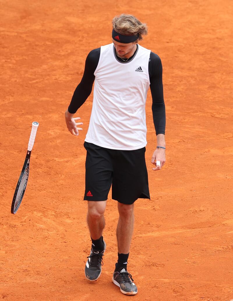 Germany's Alexander Zverev smashes his racket after losing the first set against David Goffin of Belgium. Getty