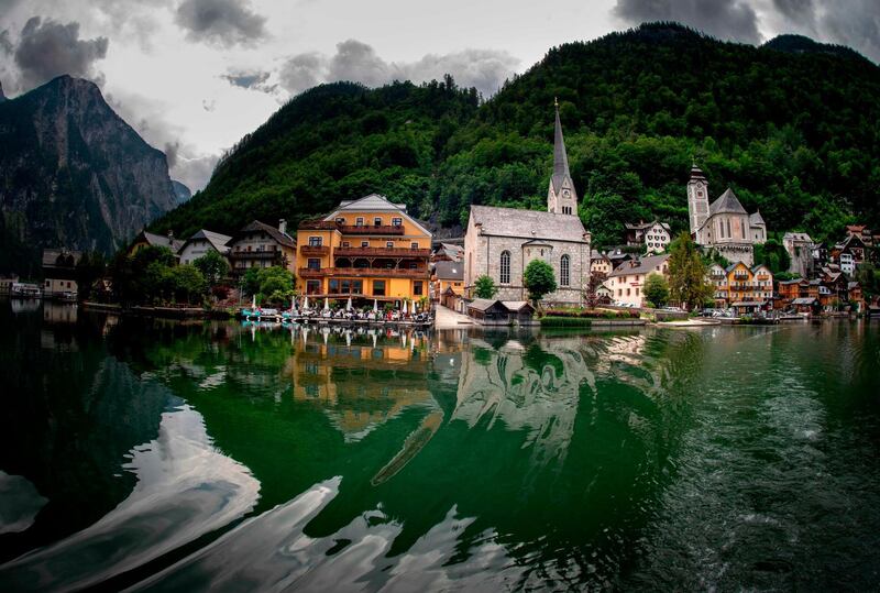 Only a few months ago residents of the impossibly picturesque Austrian village of Hallstatt were debating how to stem the influx of tourists thronging its narrow streets, nestled between soaring mountains and a sparkling lake.  AFP