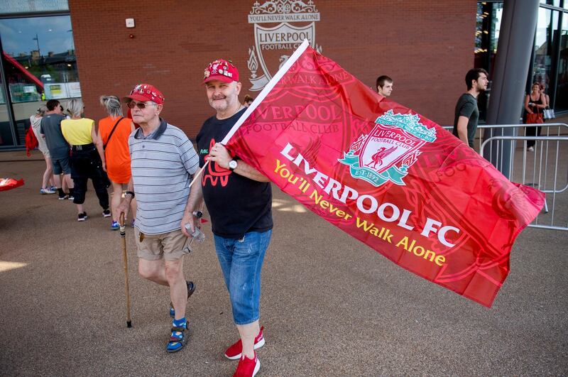 Liverpool fans celebrate outside Anfield on Friday, the second day of partying. EPA