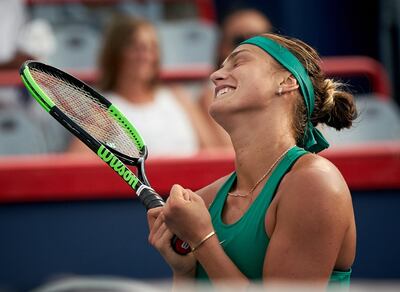 epa06939397 Aryna Sabalenka of Belarus celebrates her victory against Caroline Wozniacki of Denmark during the second round of the Rogers Cup Women's tennis tournament in Montreal, Canada, 09 August 2018.  EPA/ANDRE PICHETTE