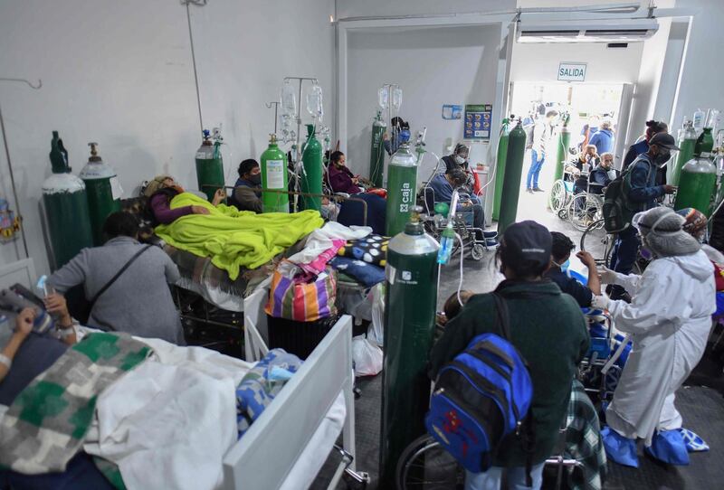People are assisted in a specialized facility for Covid-19 patients in the southern city of Arequipa, Peru. AFP