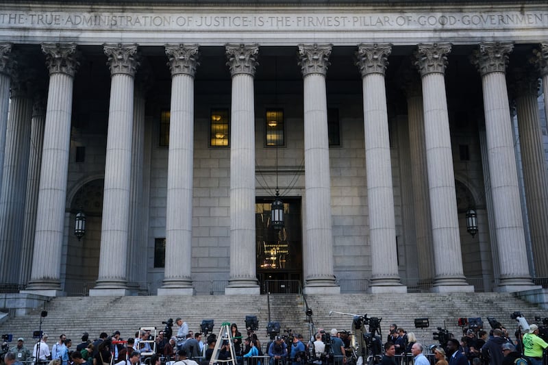 Members of the media outside the New York State Supreme Court Building in New York. Bloomberg