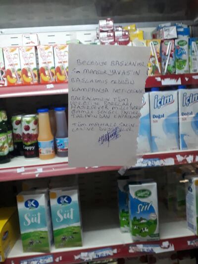 "The debts of the debtors were paid by Ankara deputy Gamze Tascier," says a note at a grocery store. Courtesy Gamze Tascier
