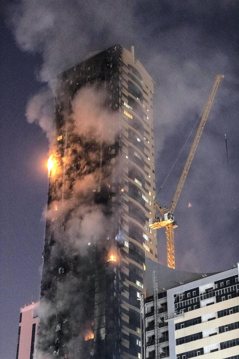 SHARJAH, UNITED ARAB EMIRATES. 05 MAY 2020. STANDALONE. Fire at the Abbco Tower near Nahda Park in Sharjah. Police and fire fighters responded to a blaze that was reported after 8:30. (Photo: Antonie Robertson/The National) Journalist: Salam Al Amir. Section: National.