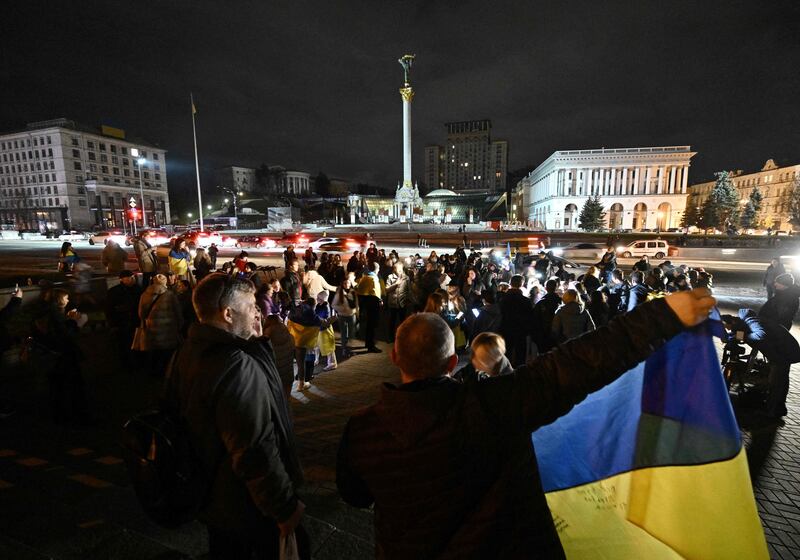 People gathered in Maidan Square to celebrate the liberation of Kherson, in kyiv.  AFP