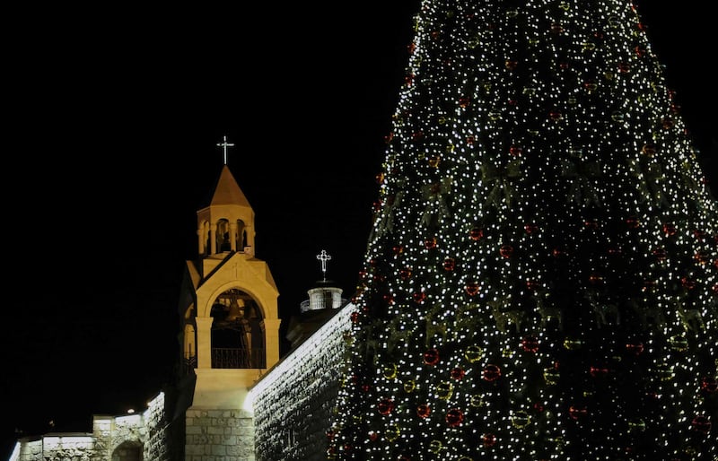 Bethlehem lit up its Christmas tree evening but without the usual crowds, as novel coronavirus restrictions put a damper on the start of Christmas festivities in the holy city. AFP