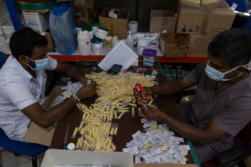 Pharmacists arrange drugs at Colombo South Teaching Hospital. Getty Images