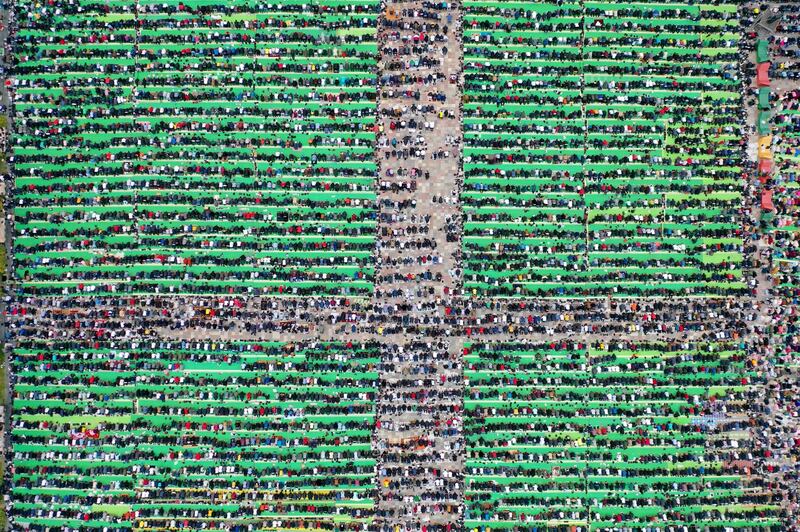 Albanian Muslims pray in Skanderbeg Square, Tirana, on the first day Eid Al Fitr. AFP