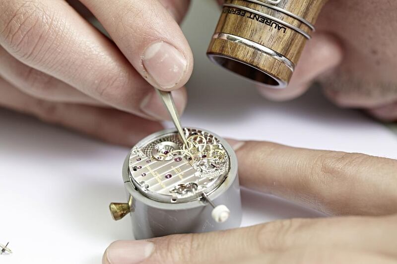 A watchmaker works on a timepiece at the Laurent Ferrier workshop near Geneva, Switzerland. Courtesy Atelier Laurent Ferrier