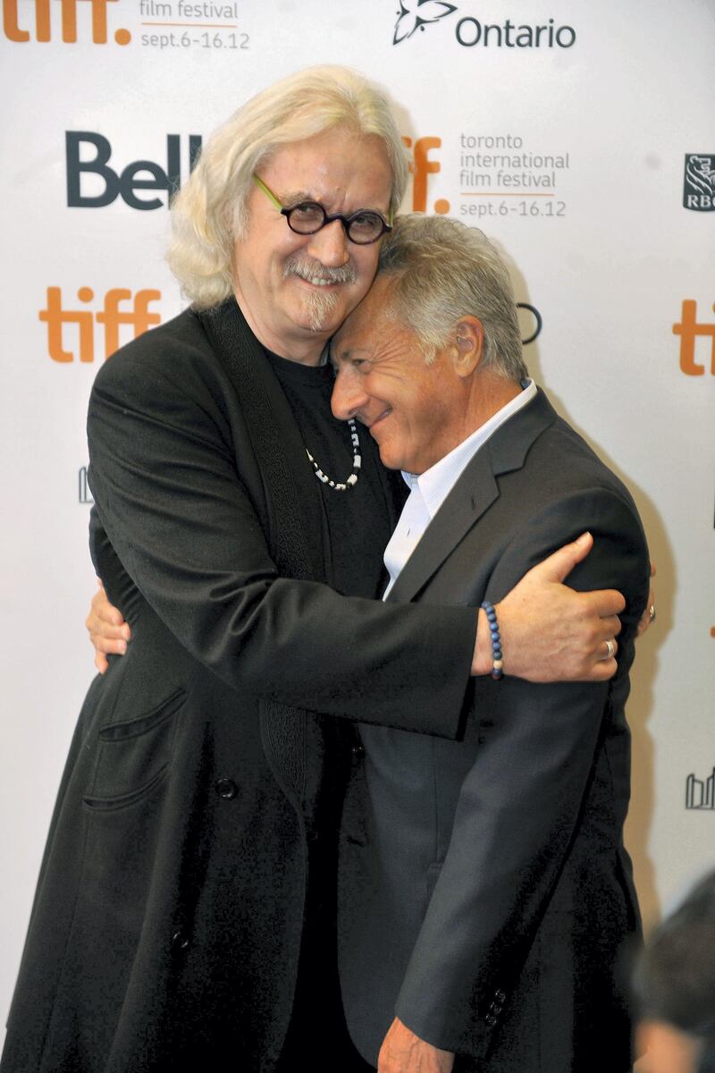TORONTO, ON - SEPTEMBER 09: Actor Billy Connolly (L) and director Dustin Hoffman arrive at the "Quartet" Premiere at the 2012 Toronto International Film Festival at The Elgin on September 9, 2012 in Toronto, Canada.   Jag Gundu/Getty Images/AFP