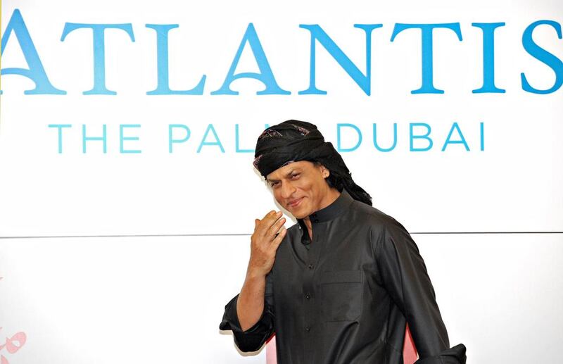 Shah Rukh Khan arrives at a news conference at the Atlantis Hotel on The Palm Jumeeriah in Dubai on September 12, 2013. Jeff Topping for The National