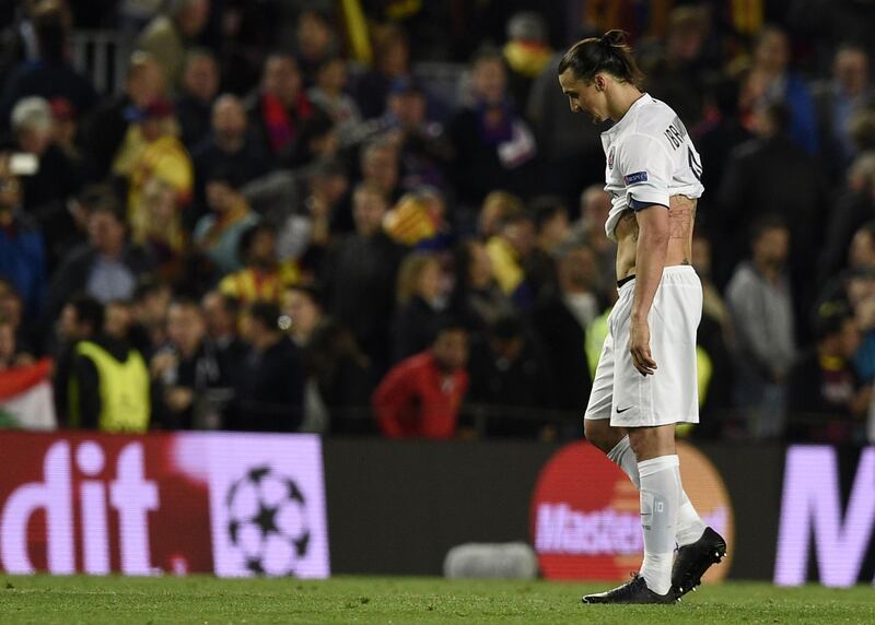 Paris Saint-Germain's Swedish forward Zlatan Ibrahimovic reacts at the end of the UEFA Champions League quarter-finals second leg football match FC Barcelona vs Paris Saint-Germain at the Camp Nou unior stadium in Barcelona on April 21, 2015. Barcelona won 2-0 and get qualified for the semis.    AFP PHOTO/ LLUIS GENE (Photo by LLUIS GENE / AFP)