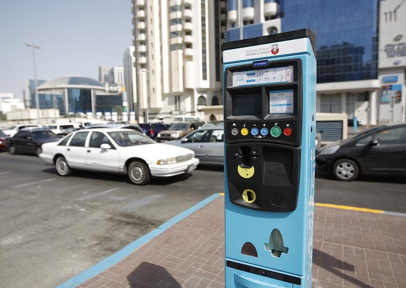 People in Abu Dhabi no longer need to carry coins to feed a parking meter. Philip Cheung / The National