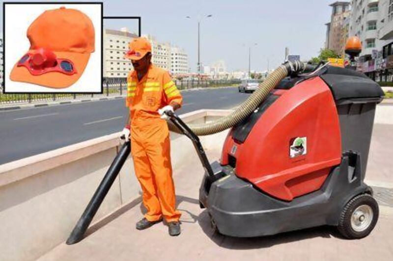 Dubai Municipality is distributing solar powered cooling hats for its outdoor workers. Photo courtesy Dubai Municipality