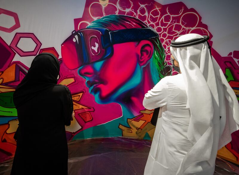 A graffiti art workshop at the World Conference on Creative Economy 2021, held at Expo 2020 Dubai. Victor Besa / The National.