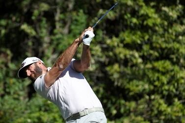 PACIFIC PALISADES, CALIFORNIA - FEBRUARY 18: Dustin Johnson of the United States plays his shot from the fourth tee during the second round of The Genesis Invitational at Riviera Country Club on February 18, 2022 in Pacific Palisades, California.    Rob Carr / Getty Images / AFP
