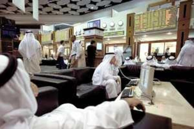 Dubai, UAE - June 17, 2009 - Traders on the floor of the Dubai Financial Market stock exchange. (Nicole Hill / The National) *** Local Caption ***  NH Stock01.jpg
