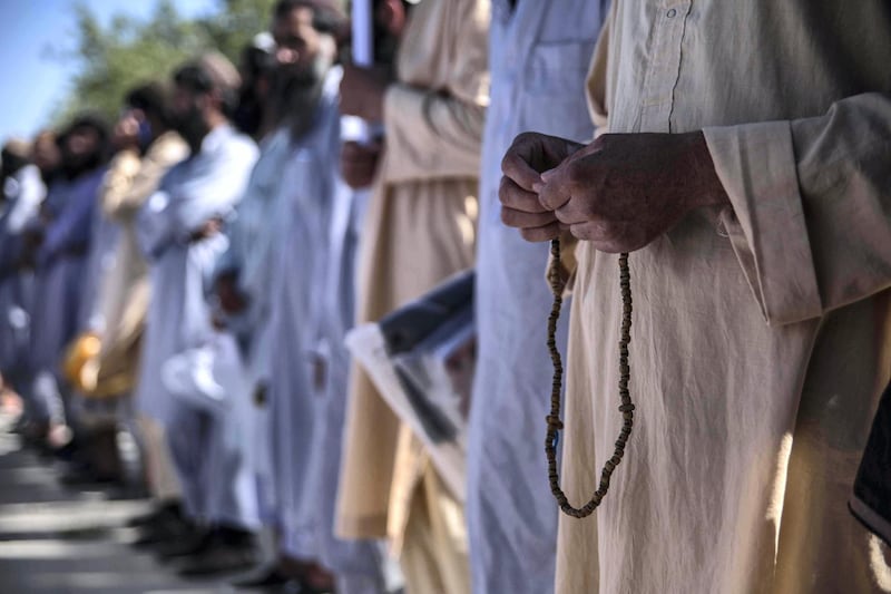 Taliban prisoners wait for their release at a government prison north of Kabul. 900 prisoners were released throughout Afghanistan on Tuesday, the last day of the Islamic festival of Eid-alFirt and the last day of the three-day ceasefire. Stefanie Glinski for The National