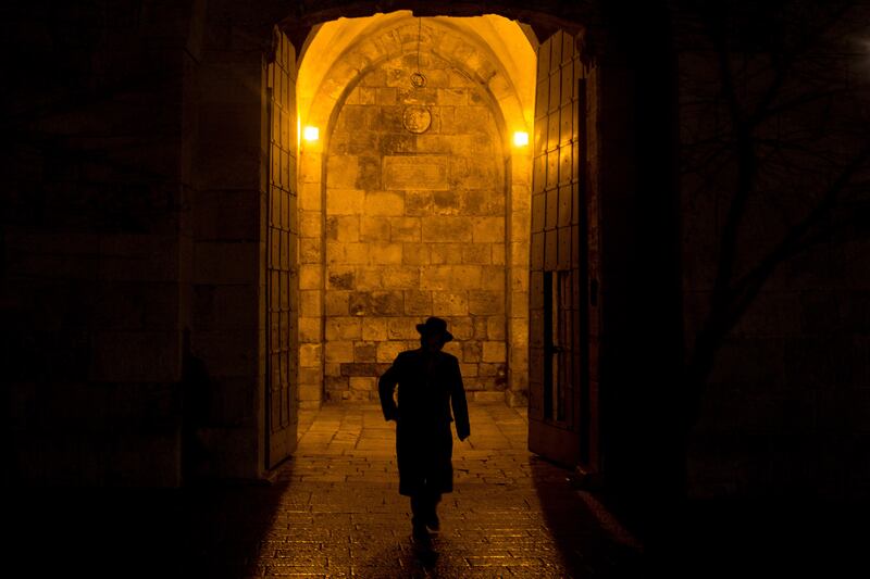 An Orthodox Jew walks through the Jaffa Gate in the Old City of Jerusalem. Getty Images