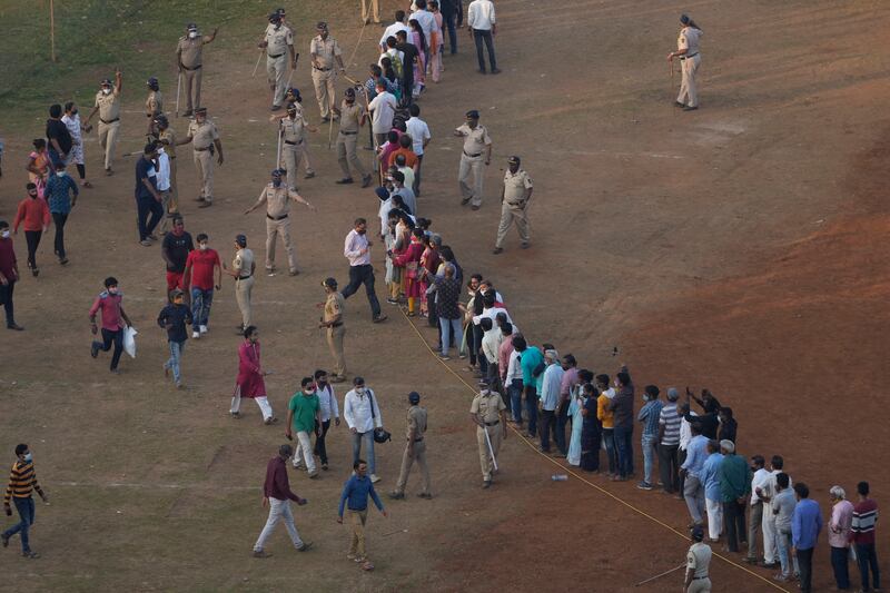 People line up to pay last respects to Lata Mangeshkar in Mumbai. AP