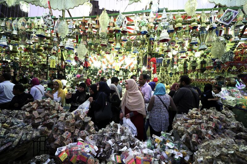 Egyptians buy Ramadan decoration items 'Fanous' (Lantern) at a market in Cairo, Egypt. Date traders in Egypt have the annual tradition of naming their merchandise after local and foreign celebrities and landmark events prior to Ramadan.  EPA