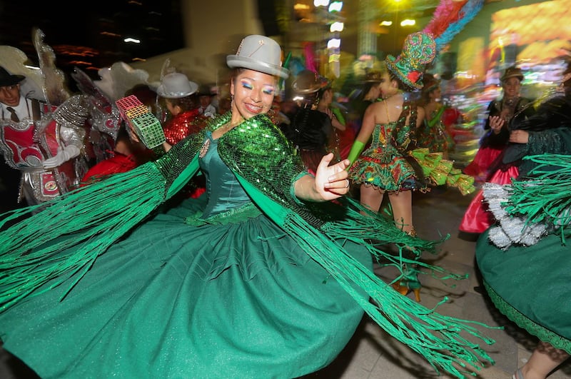 Dancers perform the morenada dance during the presentation of the new logo for the city of La Paz in Bolivia. EPA