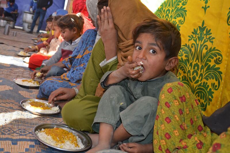 Flood victims pictured in Balochistan, Pakistan in January 9, 2023, The UN has called for 'massive investments' to help Pakistan recover from last year's devastating floods and better resist climate change. AFP