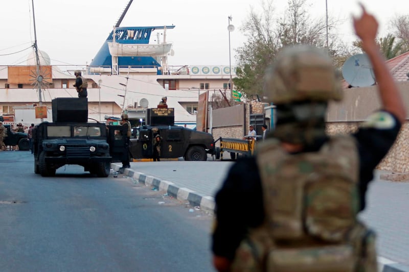 Iraqi anti-terrorism forces secure the street close to the Basra International Hotel where Iraqi Prime Minister Haider Al Abadi stays in Basra. AFP