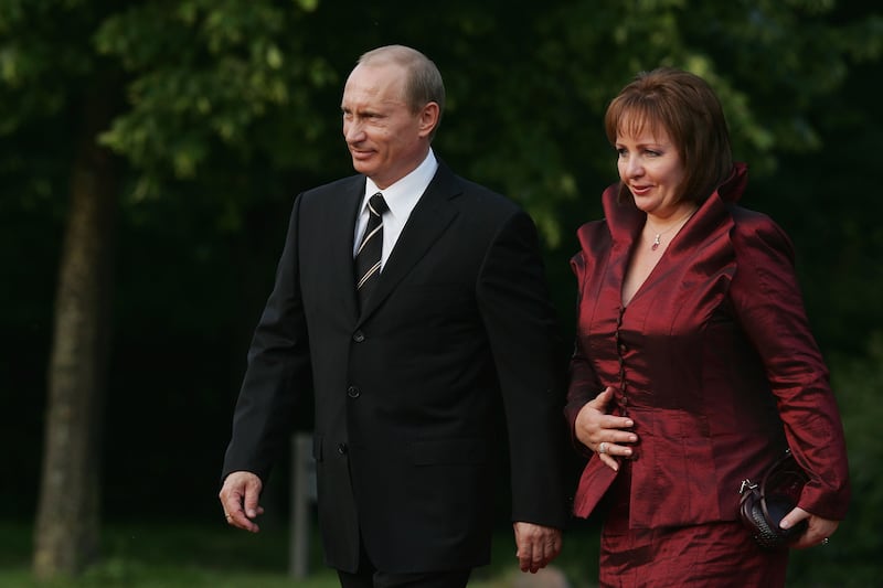 Russian President Vladimir Putin and his then wife Lyudmila Putina arrive at the opening dinner of the G8 summit in 2007. Getty Images