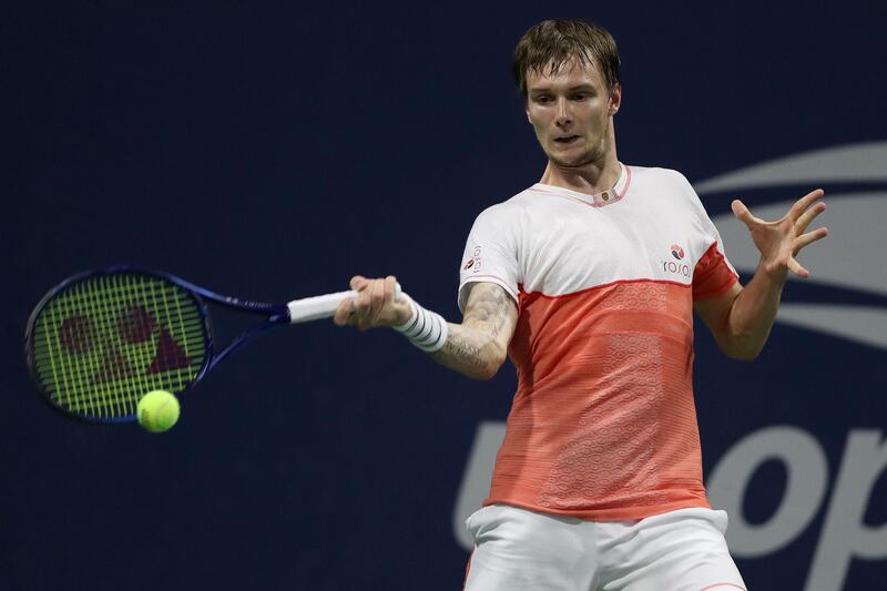 Alexander Bublik of Kazakhstan returns shot during his Men's Singles round one match against Kyle Edmund of Great Britain. AFP